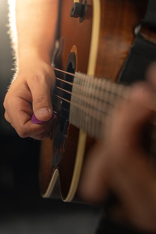 Live Music - Musician Playing Guitar